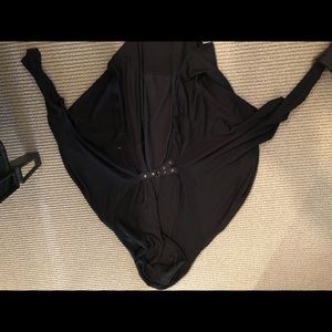 Sweat type jacket with funky sleeves and hood.